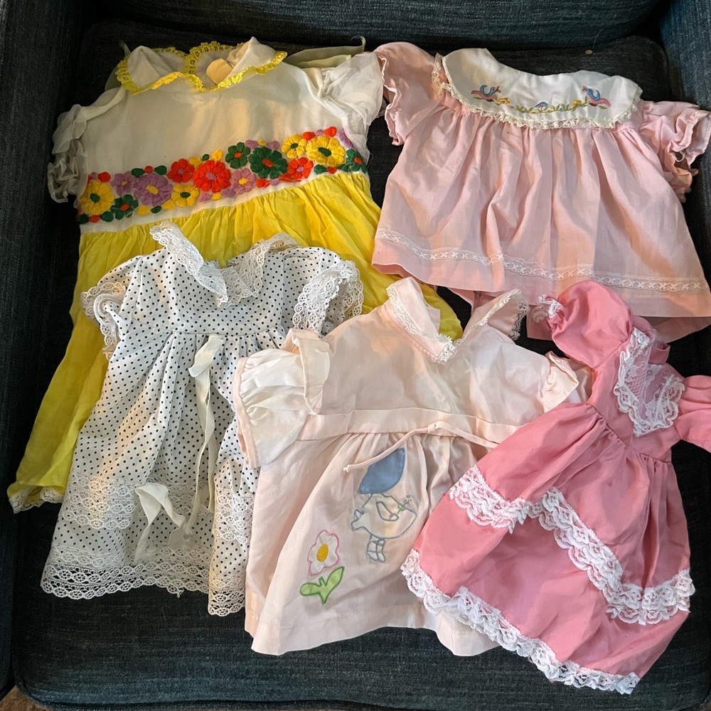 Lot of vintage 70s/80s doll clothes. Probably not haunted.